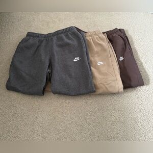 nike sweatpants - gray, tan, and brown